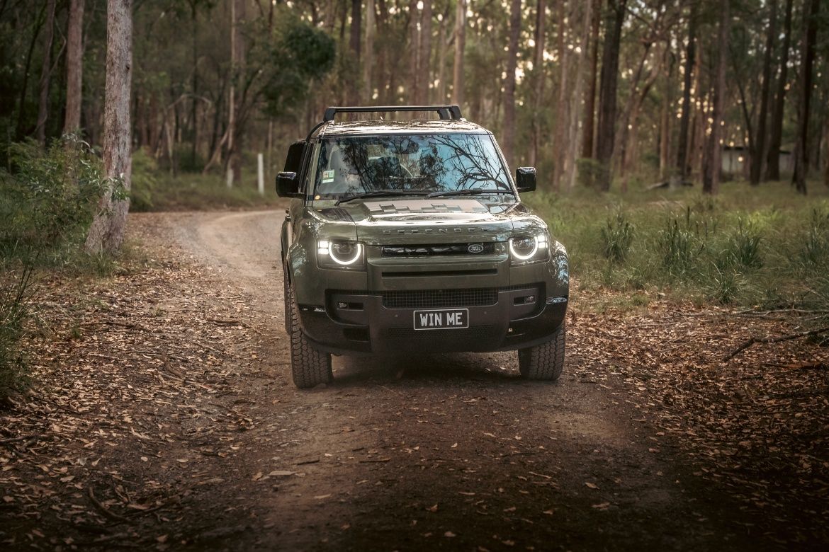 Fully kitted V8 Land Rover Defender 110 on a bush track