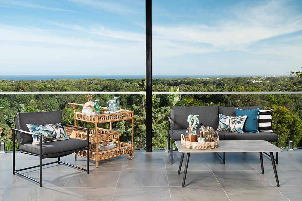 Image of the Balcony seat and drinks shot with view in background of Endeavour Prize Home 420 Yaroomba Sunshine Coast